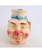 Grotesque Pitcher