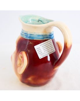 Grotesque Pitcher