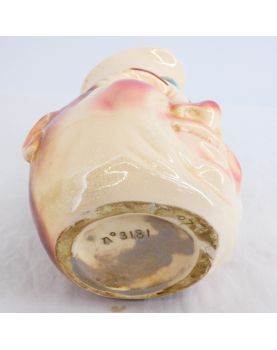 Grotesque Pitcher