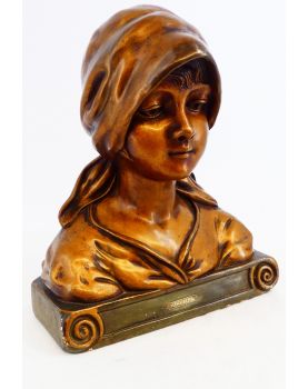 Bust of a Woman in Gilded Plaster in the Village