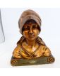 Bust of a Woman in Gilded Plaster in the Village