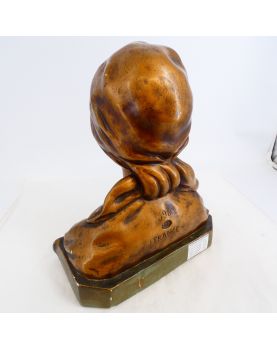 Bust of a Woman in Gilded Plaster in the Village