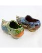 Pair of Glazed Earthenware Clogs