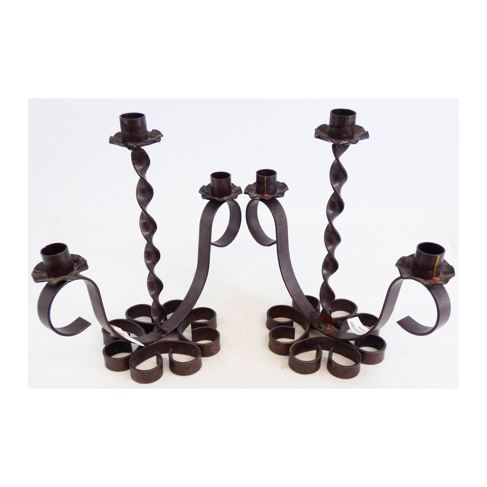 Pair of Wrought Iron Candlesticks Pair of Wrought Iron Candlesticks