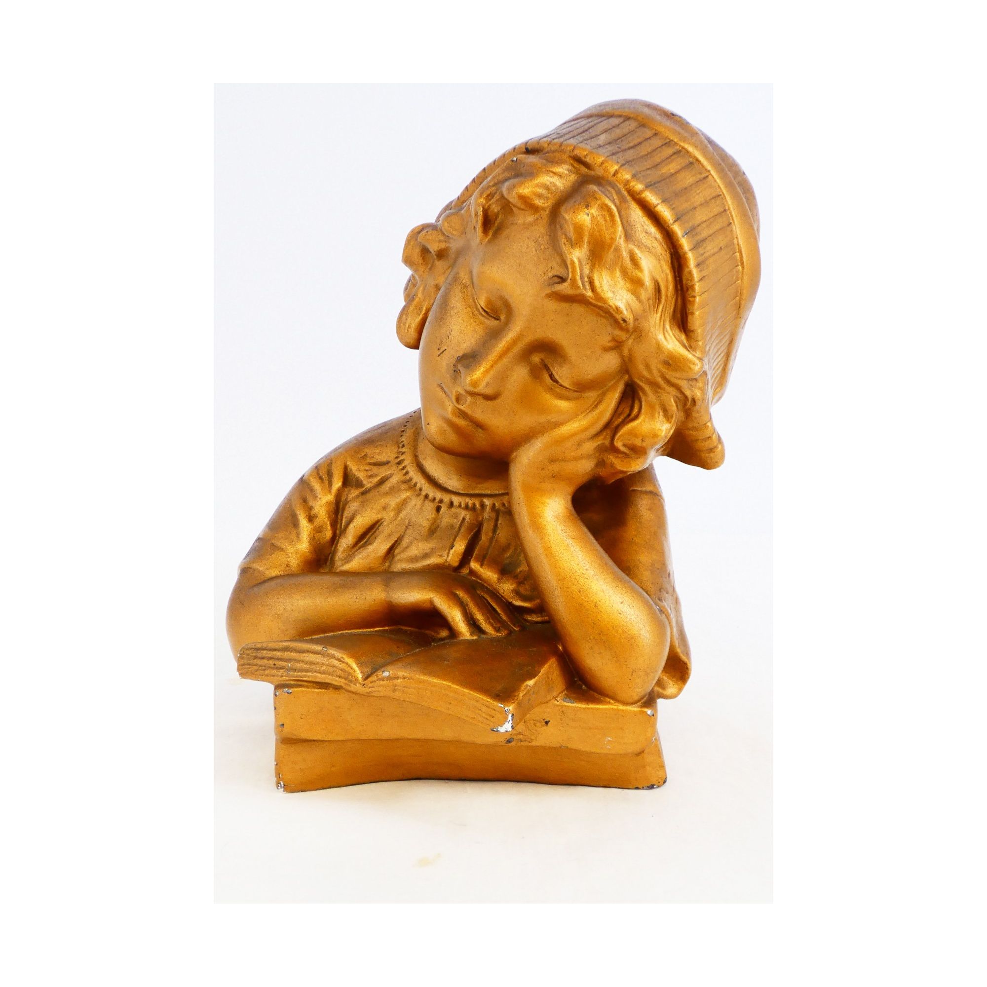 Golden Bust of a Little Girl Reading Golden Bust of a Little Girl Reading