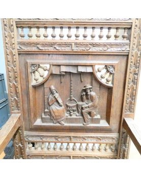 Carved wooden armchair with Breton decor