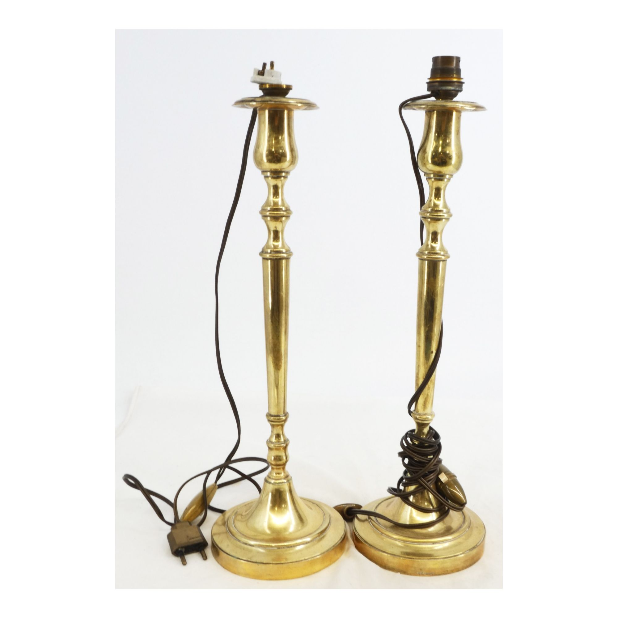 Pair of electrified bronze candlesticks Pair of electrified bronze candlesticks