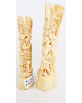 Pair of carved bone statuettes